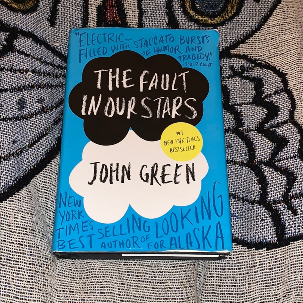 The Fault in Our Stars written by John Green Book